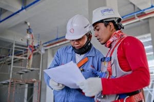 construction workers wearing hard hats